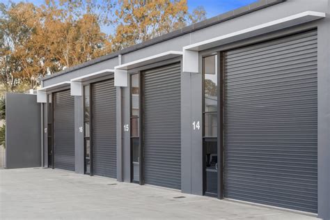 glass house with metal roller shutters|rolling shutters for business.